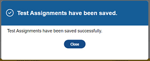 Assignments Saved confirmation pop-up.